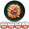 The Nacho Average Bowl features sweet potato fries topped with lean ground beef, cheese sauce, and colorful tortilla strips. It has 360 calories, 37g protein, 48g carbs, and 3g fat—making it perfect for a healthy lunch.