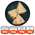 Enjoy three slices of the Philly Cheesesteak Quesadilla on a black plate—a macro-friendly option delivering 44g protein, 40g carbs, and 30g fat for only 606 calories. Ideal for high-protein meal prep or curbing your cheesesteak cravings. Full nutrition details below.