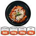 Rigatoni Meatballs: Rigatoni in red sauce with beef meatballs, shredded cheese, and parsley—a macro-friendly meal prep. Nutrition: 562 calories, 40g protein, 50g carbs, 18g fat.