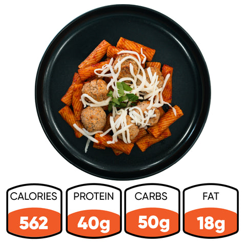 Rigatoni Meatballs: Rigatoni in red sauce with beef meatballs, shredded cheese, and parsley—a macro-friendly meal prep. Nutrition: 562 calories, 40g protein, 50g carbs, 18g fat.