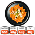 A black plate with Rigatoni Meatballs in red sauce, topped with shredded cheese, is viewed from above. Nutrition info below: 562 calories, 40g protein, 60g carbs, and 18g fat.