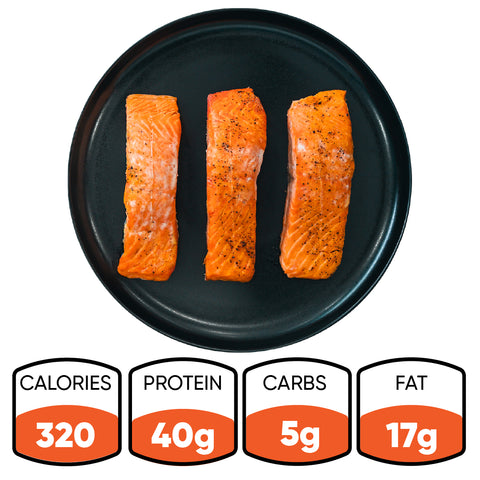 A black plate holds Competition Approved Lemon Pepper Salmon 1lb. Nutrition per serving: 320 calories, 40g protein, 5g carbs, and 17g fat—making it a low-carb, high-protein meal prep choice.