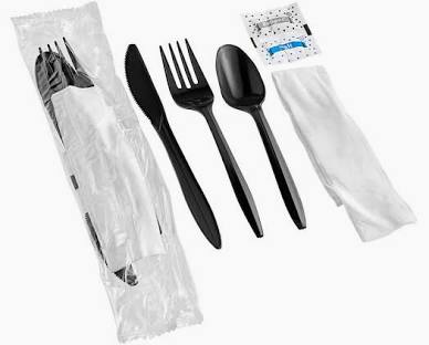 The 5 Piece Wrapped Cutlery Set includes a black plastic knife, fork, spoon, napkin, and salt packet in a clear wrapper. Conveniently comes in a 250 ct box for easy stocking at events or workplaces.