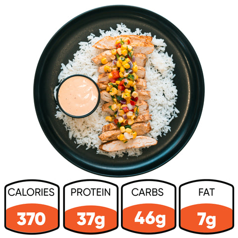 The Southwest Chicken Bowl is a gluten-free meal with sliced grilled chicken and corn-pepper salsa over white rice, served with sauce. It has 370 calories, 37g protein, 46g carbs, and 7g fat—a great high-protein meal prep choice.