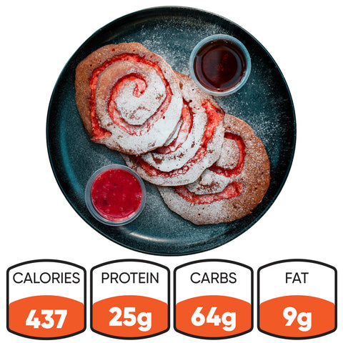 Three Jelly Donut Buffin Pancakes topped with a strawberry swirl and powdered sugar come with two containers of red syrup. Each serving has 437 calories, 25g protein, 64g carbs, and 9g fat.