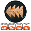 Four triangular sandwich pieces on a black plate, made with the Strongsville Chicken Ranch Fold for a delicious high-protein meal. Nutrition info below: 430 calories, 57g protein, 26g carbs, and 12g fat.