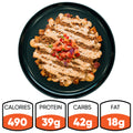 A black plate of TexMex Potato Hash—a gluten-free dinner with ground beef, potatoes, veggies, and creamy sauce—sits surrounded by nutrition icons: 490 calories, 39g protein, 42g carbs, and 18g fat.