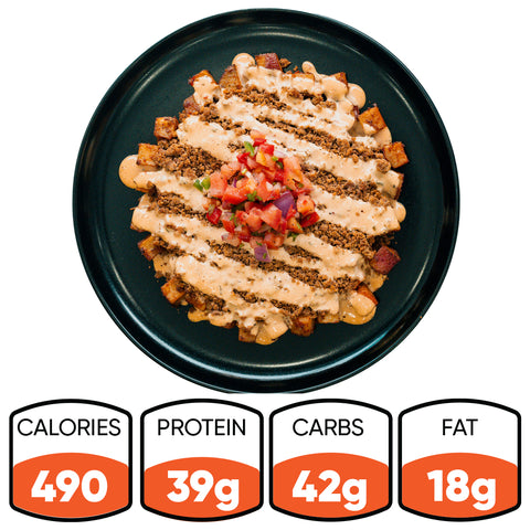 A black plate of TexMex Potato Hash—a gluten-free dinner with ground beef, potatoes, veggies, and creamy sauce—sits surrounded by nutrition icons: 490 calories, 39g protein, 42g carbs, and 18g fat.