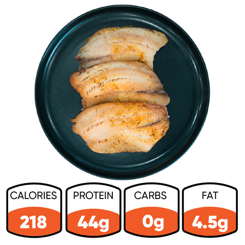 Baked Herbed Tilapia 1lb Competition Approved on a dark plate—ideal for meal prep or weight loss. Nutrition: 218 calories, 44g protein, 0g carbs, and 4.5g fat.