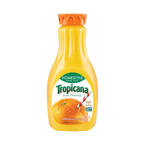 A bottle of Orange Juice-For shakes, with some pulp, featuring an orange and a straw on the label and an orange cap.