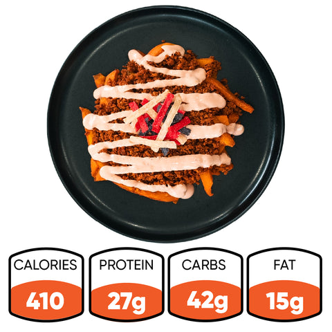 The Nacho Average Vegan Bowl features seasoned fries with plant-based protein, sauce, and garnish. Nutrition highlights: 410 calories, 27g protein, 42g carbs, and 15g fat—making it a tasty meatless option for any meal.