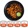 The Zeus Bowl V2 (Subscription) features seasoned chicken kebab pieces, roasted diced potatoes, and green dipping sauce. Nutrition: 400 calories, 49g protein, 34g carbs, and 7g fat.